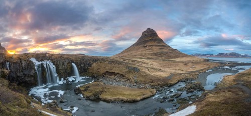 Kirkjufell mountain with Kirkjufellfoss waterfall at sunset