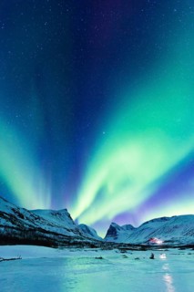Northern Lights (Aurora borealis) over mountains