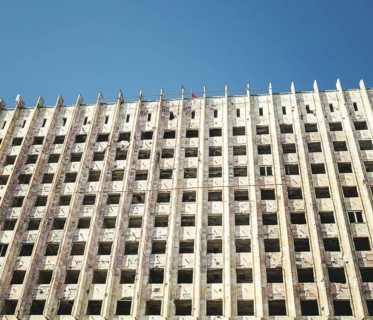 Facade of destroyed parliament building in Suchumi