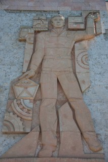 Socialist relief on old soviet factory building
