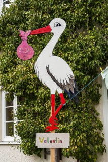 Stork figure as birth symbol