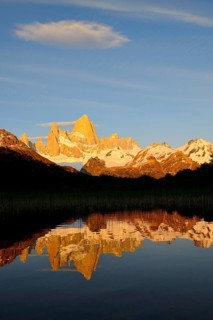 Mountain range with Cerro Fitz Roy at sunrise reflected in Lago de Los Tres