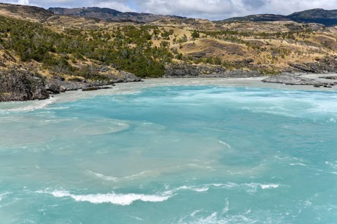 Confluence of turquoise Rio Baker and glacier gray Rio Nef