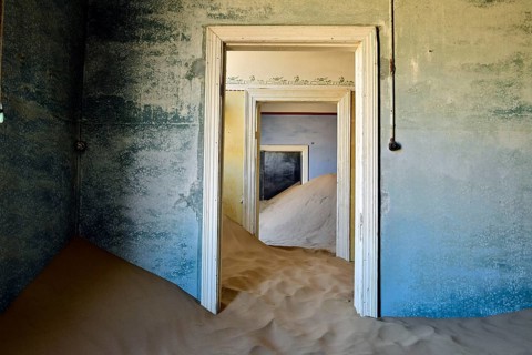 Desert sand in the ruined building of the former diamond city