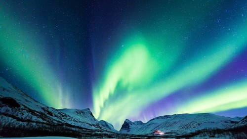 Northern Lights (Aurora borealis) over mountains