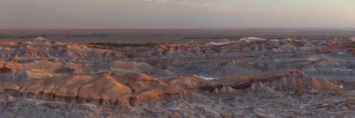 Bizarre red rock formations with white salt