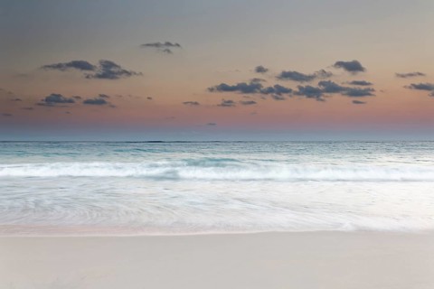 Surf during dusk over the sea