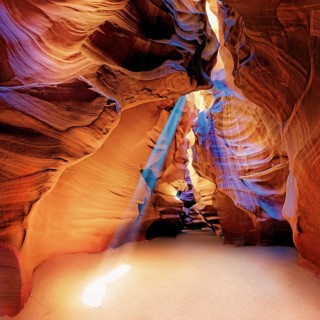 Incident light rays and yellow-red sandstone formations