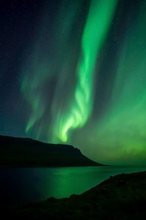 Northern lights at new moon over fjord