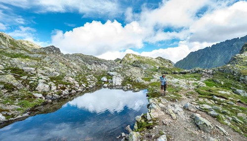 Hiker at a small lake