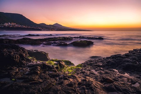 Rocky coast and sea at sunset