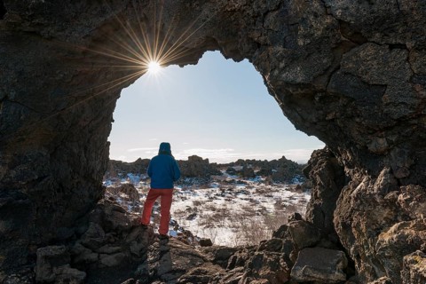 Man in a rock arch