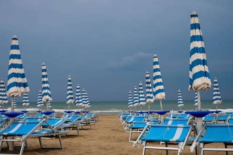 Abandoned beach chairs on the beach