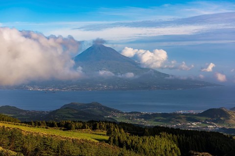 View of volcano Ponta do Pico with clouds