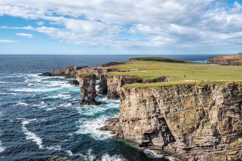 The cliffs of Yesnaby with the 35m high surf pillar