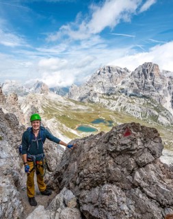 Hiker on the via ferrata to the Paternkofel