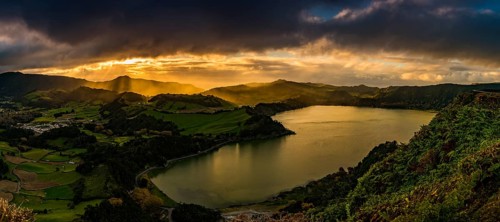 Furnassee with hilly landscape and dramatic atmospheric lighting