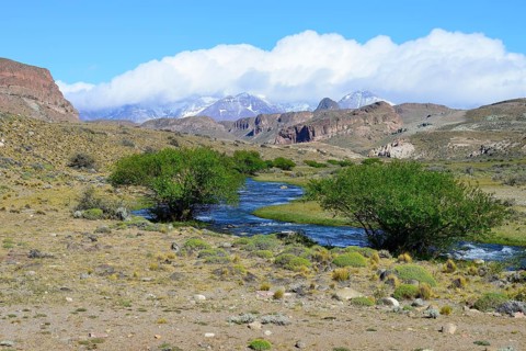 River with mountain panorama in the Meseta del Lago Buenos Aires