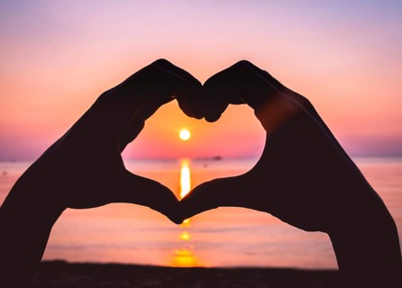 Hands form a heart
