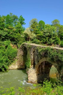 Old Ottoman stone arch bridge Ura e Golikut over river Shkumbin