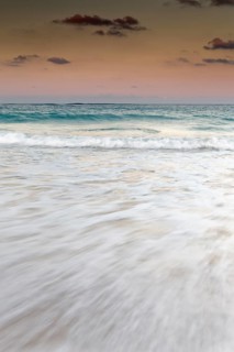Surf during dusk over the sea