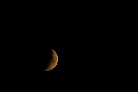 Crescent moon in the night sky