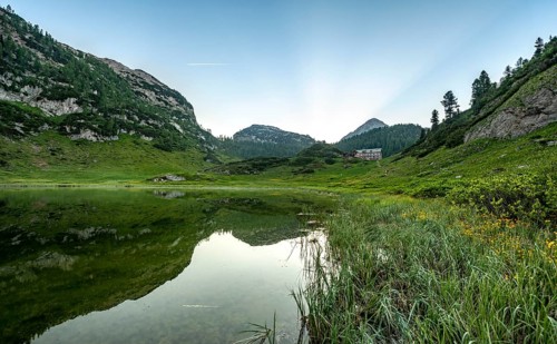 Karlingerhaus reflected in lake Funtensee