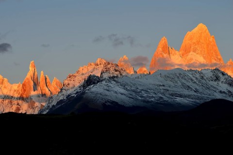 Snow-covered mountain range of the Fitz Roy and Cerro Torre at sunrise