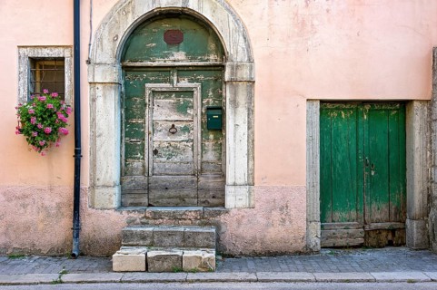 Facade with old weathered front door