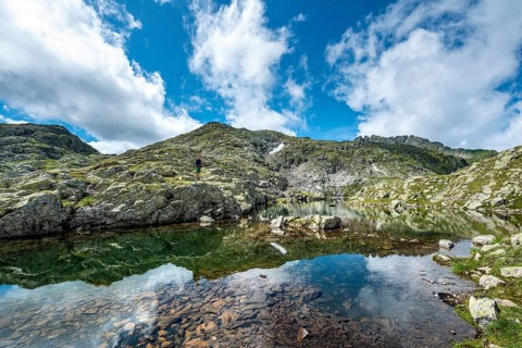 Hiker at a small lake