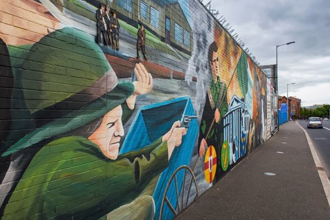 Political graffiti on wall in West Belfast reminiscent of the civil war between Protestants and Catholics