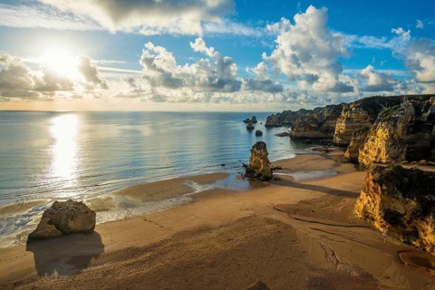 Coloured cliffs and sunrise at the beach