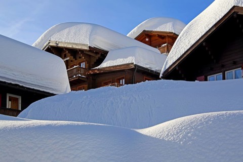 Chalets with deep snow in the village