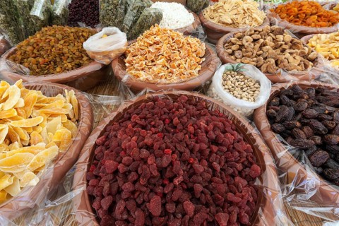 Dried and candied fruits at a market stall in Cannobio