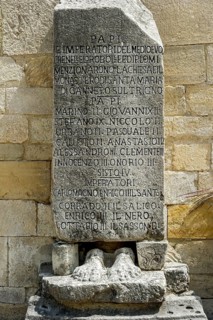 Memorial stone of various Popes at the portal of the pilgrimage church