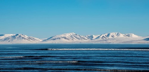 View from the peninsula Vatnsnes to sea and snow-capped mountains