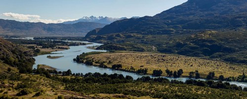 Rio Baker glacier river with the mountains of the Andes