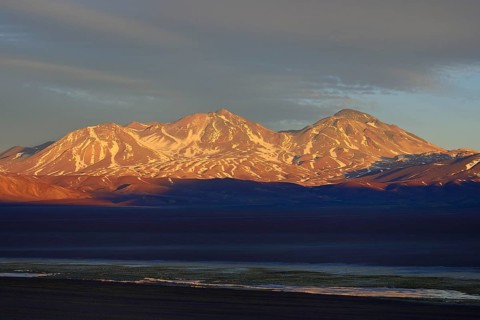 Volcano Nevado Tres Cruces at sunset