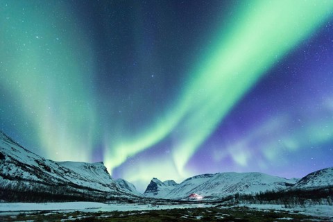 Northern Lights (Aurora borealis) over mountains
