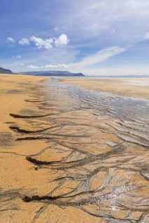 Sand structure with ripple at low tide