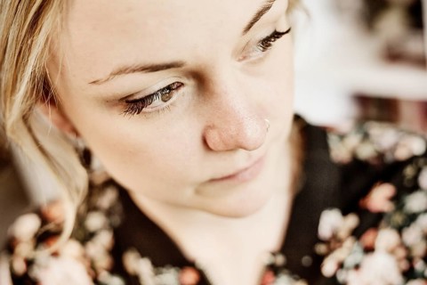 Young woman with nose piercing
