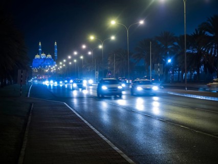 Traffic in front of illuminated Mohammed Al Ameen Mosque