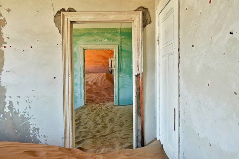 Desert sand in the ruined building of the former diamond city