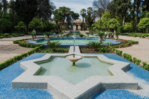 City park with fountain and flowers