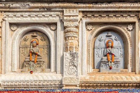 Buddha sculptures in the facade of the Mahabodhi Temple