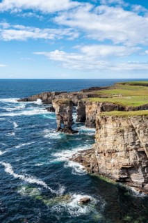 The cliffs of Yesnaby with the 35m high surf pillar