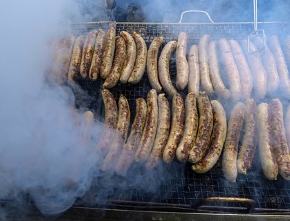 Grilled sausages wrapped in smoke