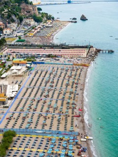 Tourist lido with umbrellas and sunbeds