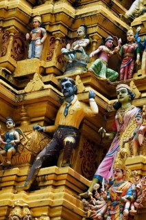 Colorful Hindu temple decorated with figures and gods