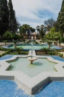 City park with fountain and flowers